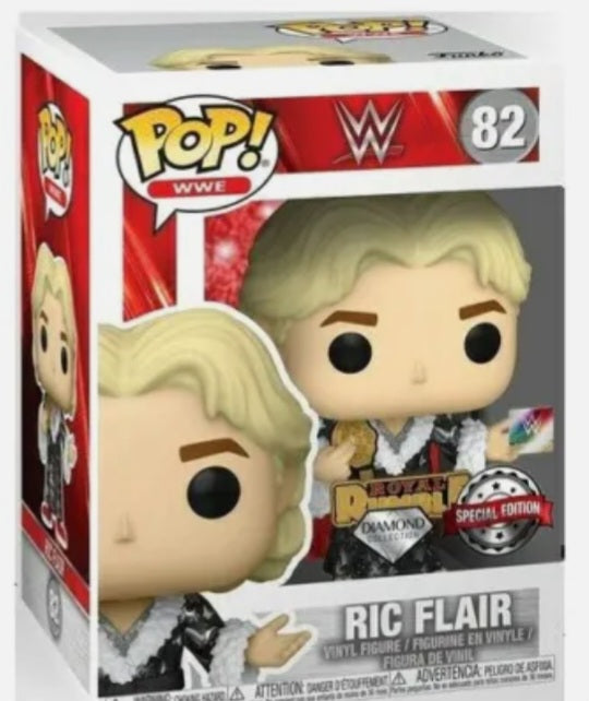 Ric Flair Funko Pop Extra! Royal Rumble Badge Pin included.